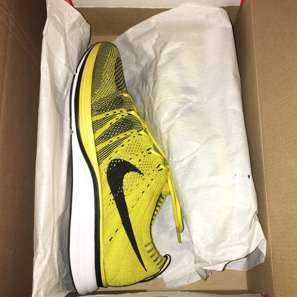 Yellow Nike Flyknit Trainers